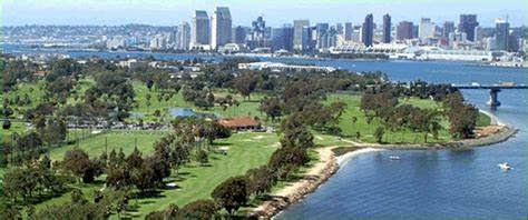 Coronado Golf Course aerial view with the city skyline in the background